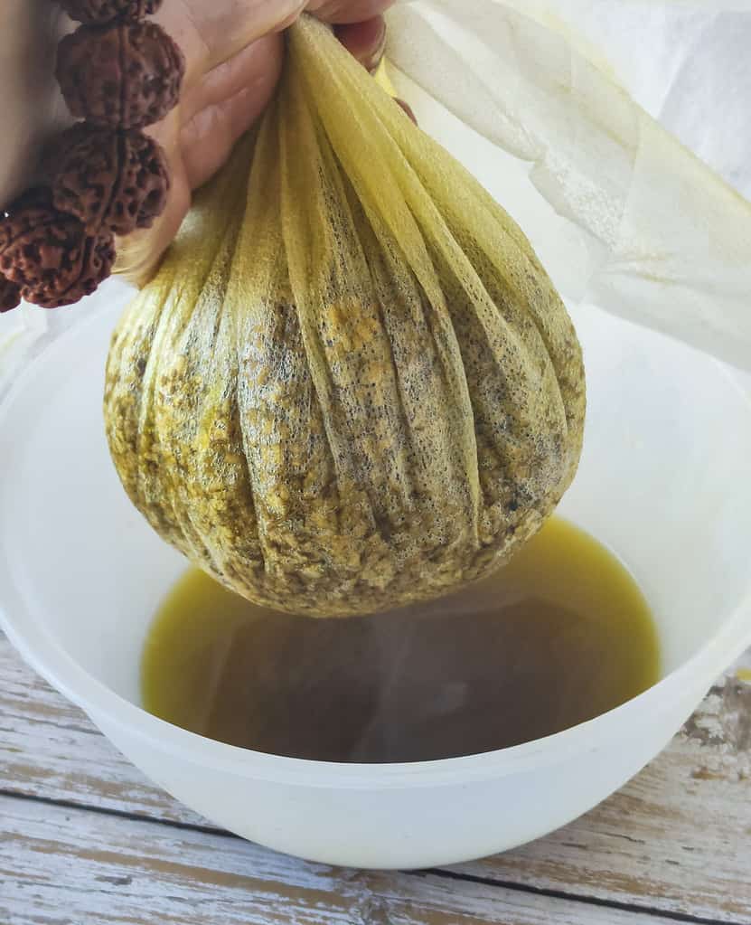 Straining helichrysum oil